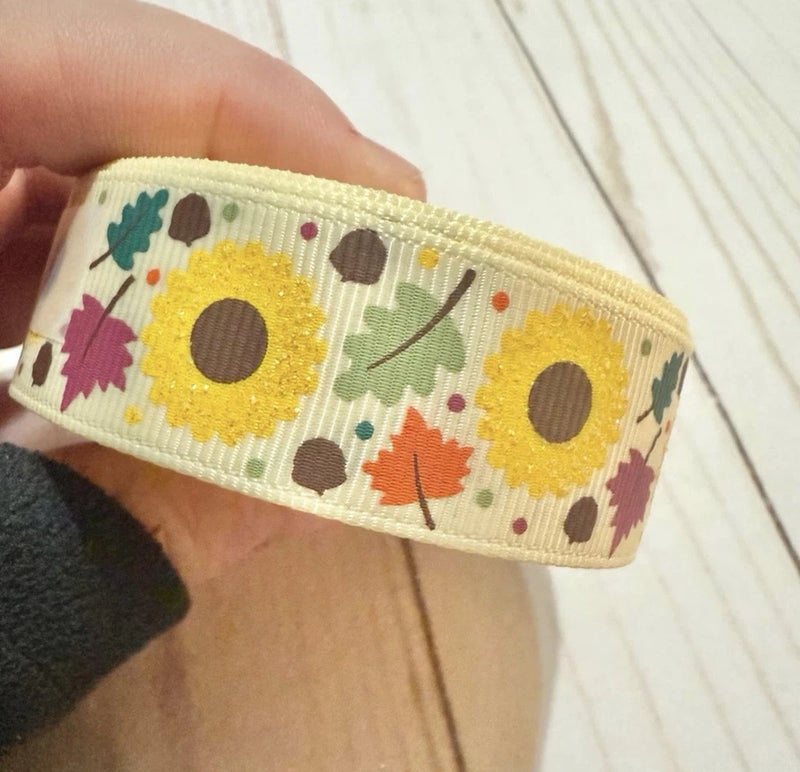 Cream grosgrain ribbon with yellow sunflower and fall leaves pattern, 1 roll length