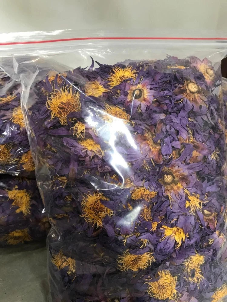 Dried blue lotus tea flowers in plastic bag, purple and yellow petals