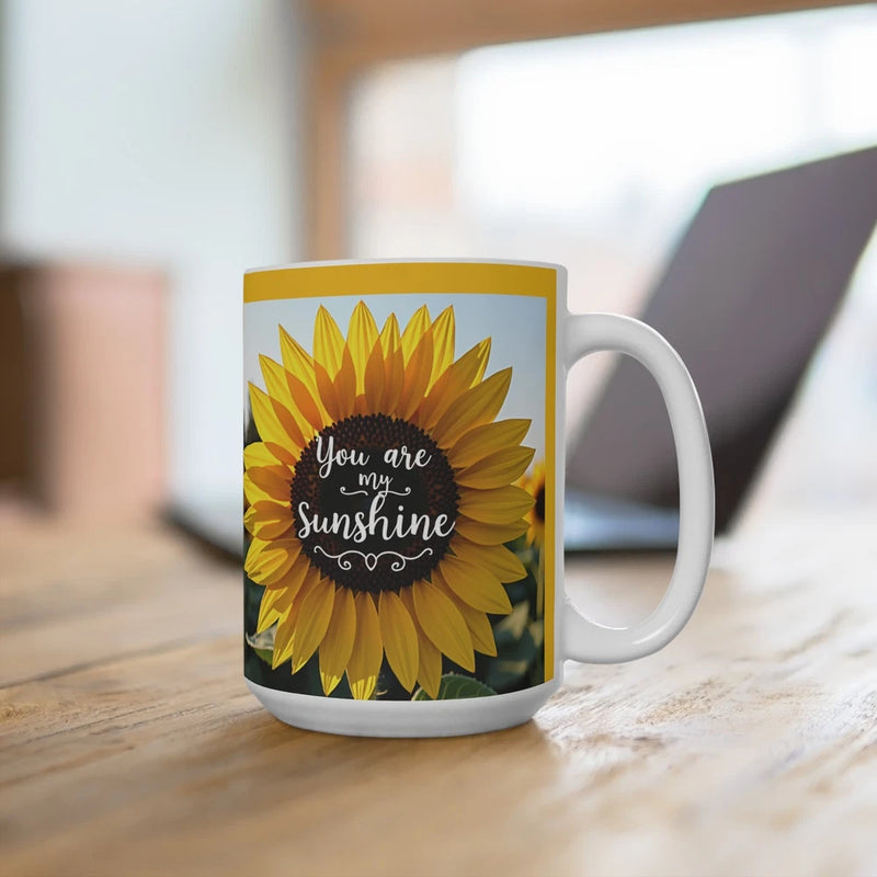 White ceramic coffee mug with large sunflower and text “You are my sunshine”