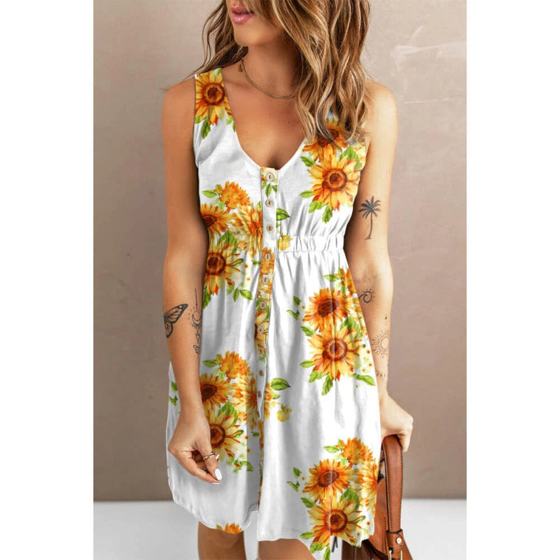 Sleeveless button-down dress with white base and sunflower print, front buttons