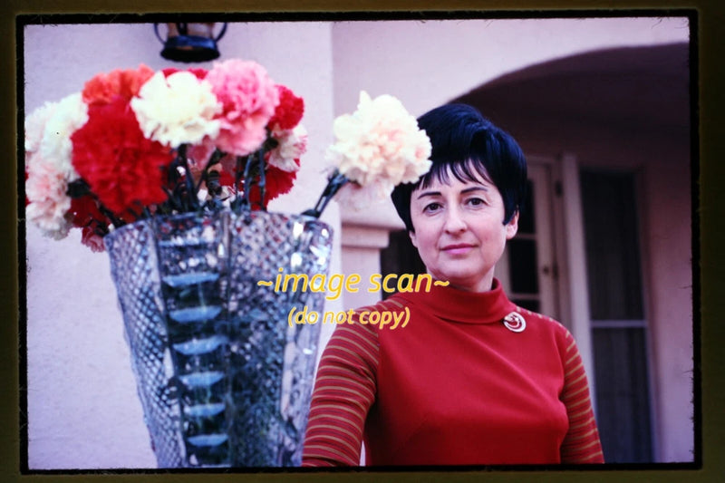 Woman with Carnation Flowers in late 1960s, Unbranded Slide aa 29-11a Carnation