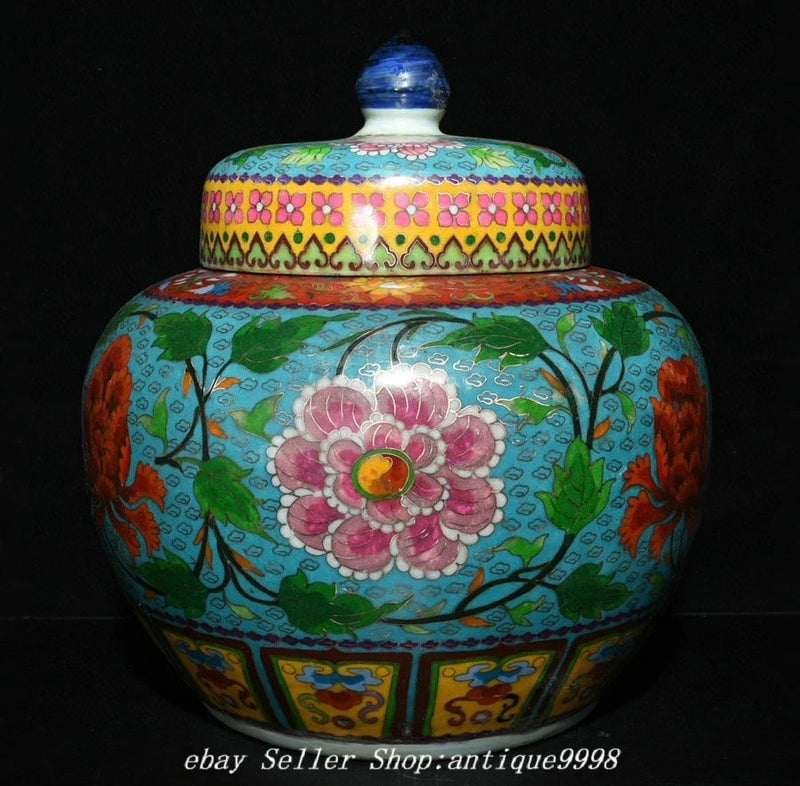 Decorative porcelain lidded jar with blue-green glaze and pink peony flower medallion