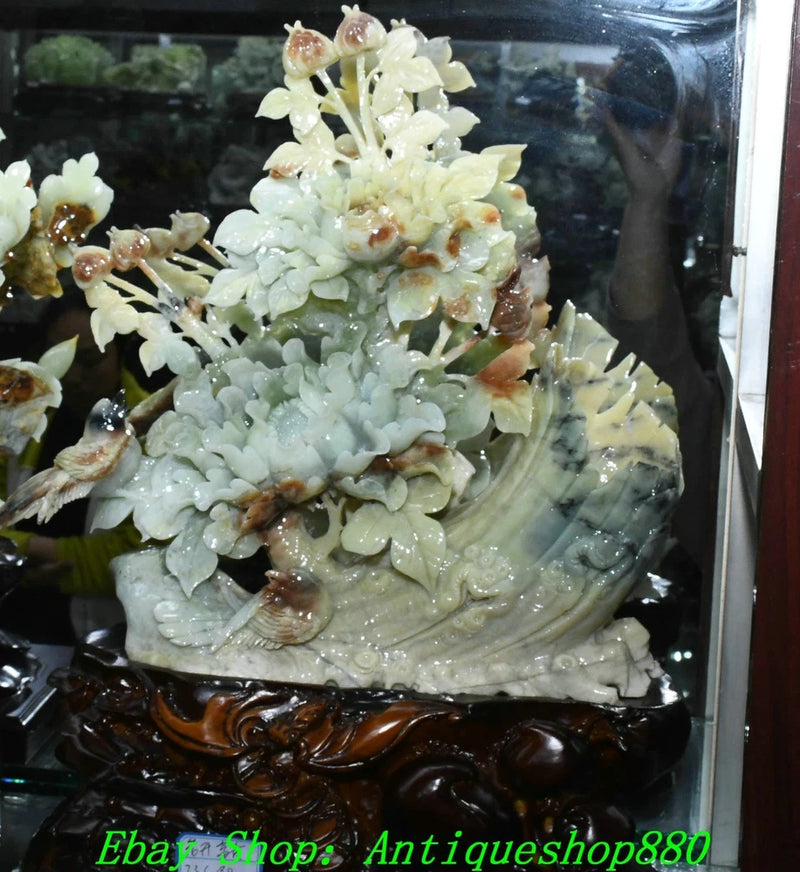Pale green jade peony flower and bird carving sculpture with ornate base