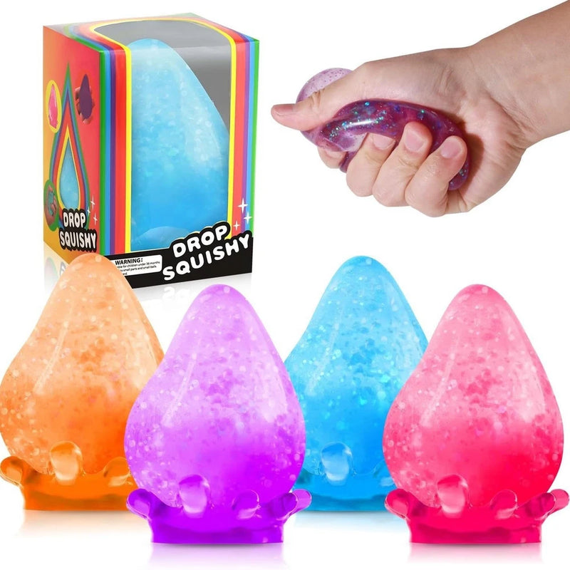 Teardrop squish stress ball set: blue, purple, and pink; one toy squeezed by hand