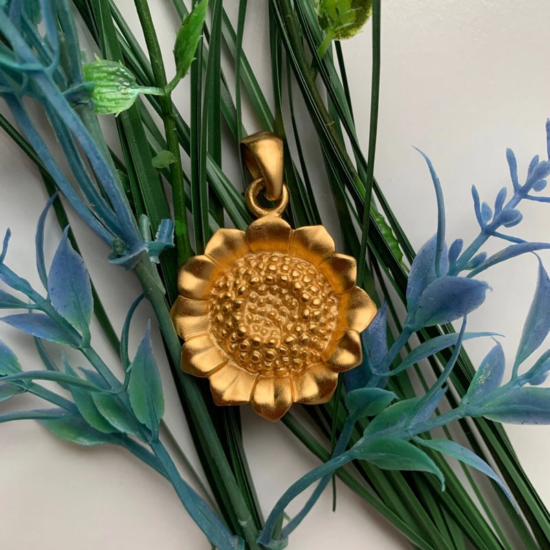 Gold-tone sunflower pendant charm with loop bail