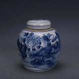 Blue and white porcelain lidded jar with floral peony design