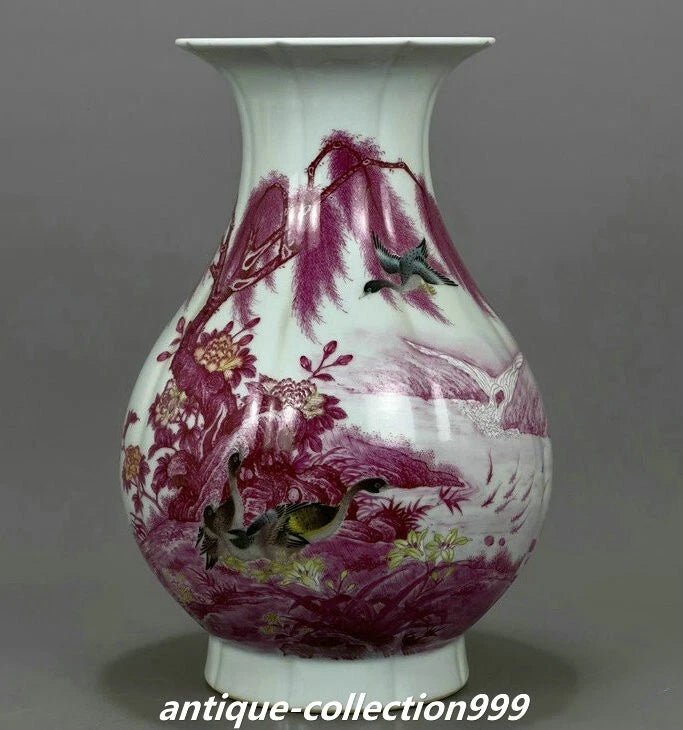 Porcelain vase in white with maroon duck and floral motif, rounded bulb shape
