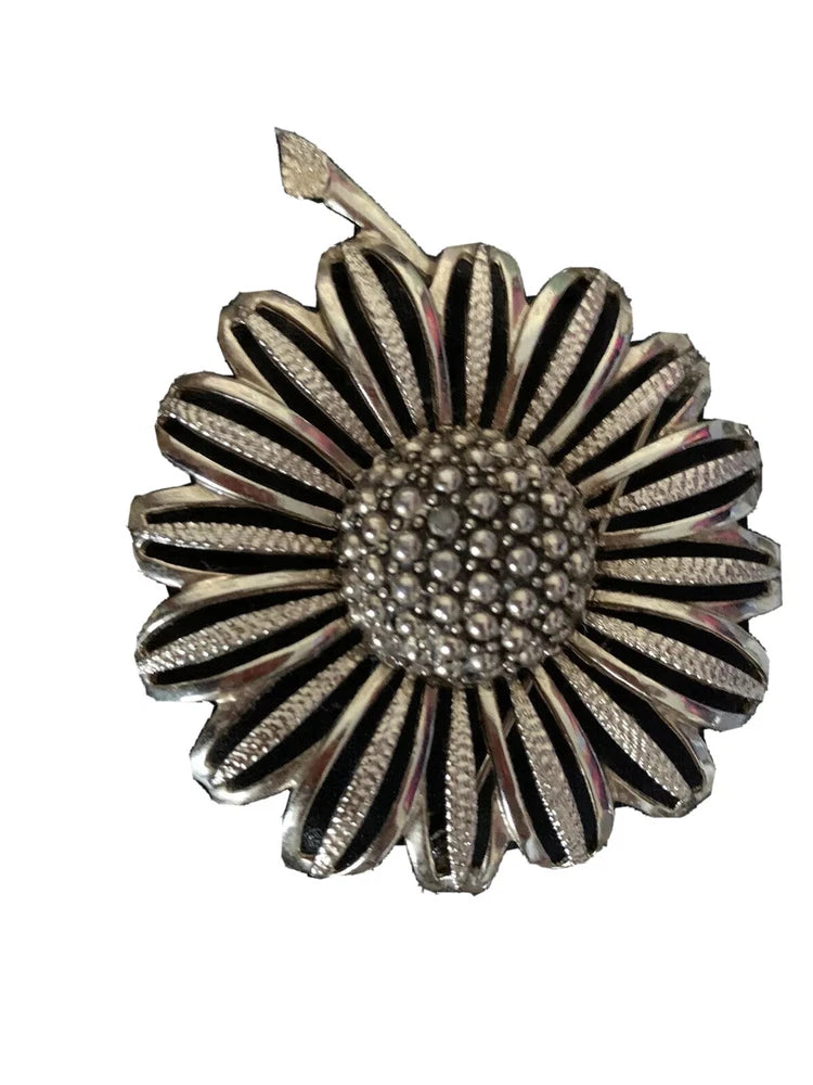 Vintage sunflower flower pin brooch with open petal design and rhinestone-like center