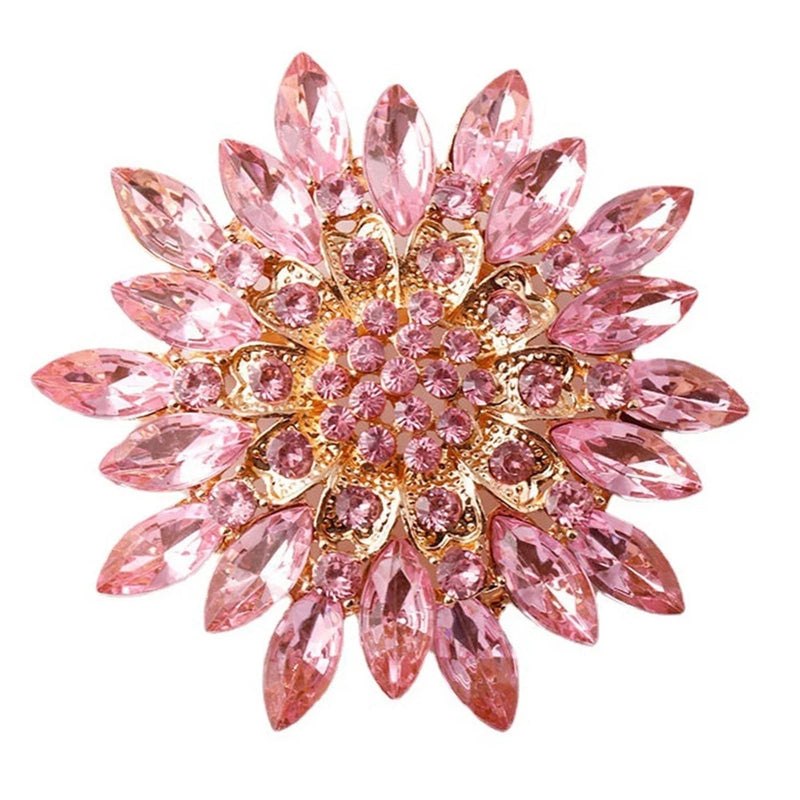 Pink rhinestone sunflower brooch pin with gold-tone center and clustered petals