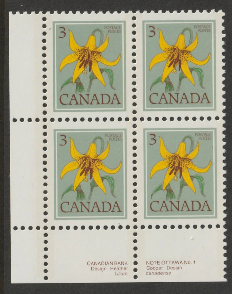 Canada lily postage stamp block of 4 with yellow flower design and Canada text