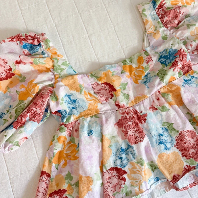 Multicolor floral peplum crop top with square neck and puff sleeves