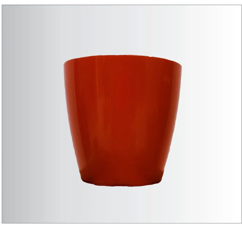 Red-orange garden planter pot with flared rim base for indoor or outdoor plants