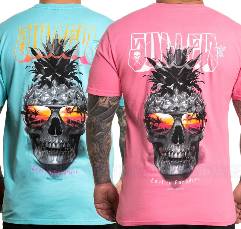 Men's short-sleeve graphic T-shirt with skull face art, turquoise and pink.