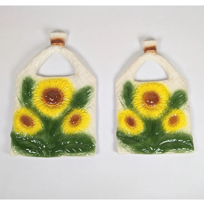 Pair of vintage ceramic sunflower hanging wall art pieces, green leaves and yellow blooms
