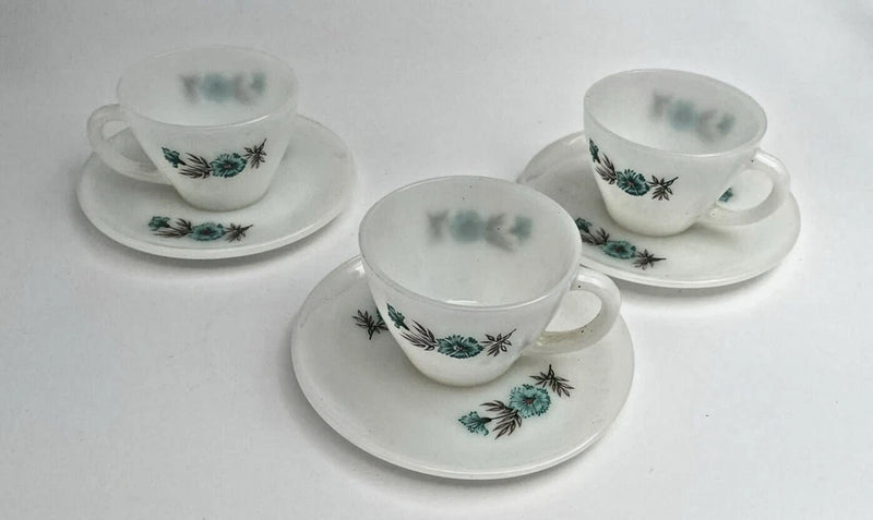 Milk glass coffee cup and saucer set of 3, with blue floral sprays on white