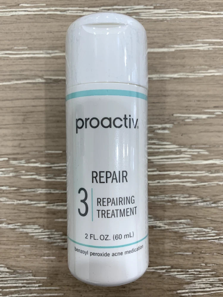 Proactiv Repairing Treatment bottle, white plastic with label text and cap