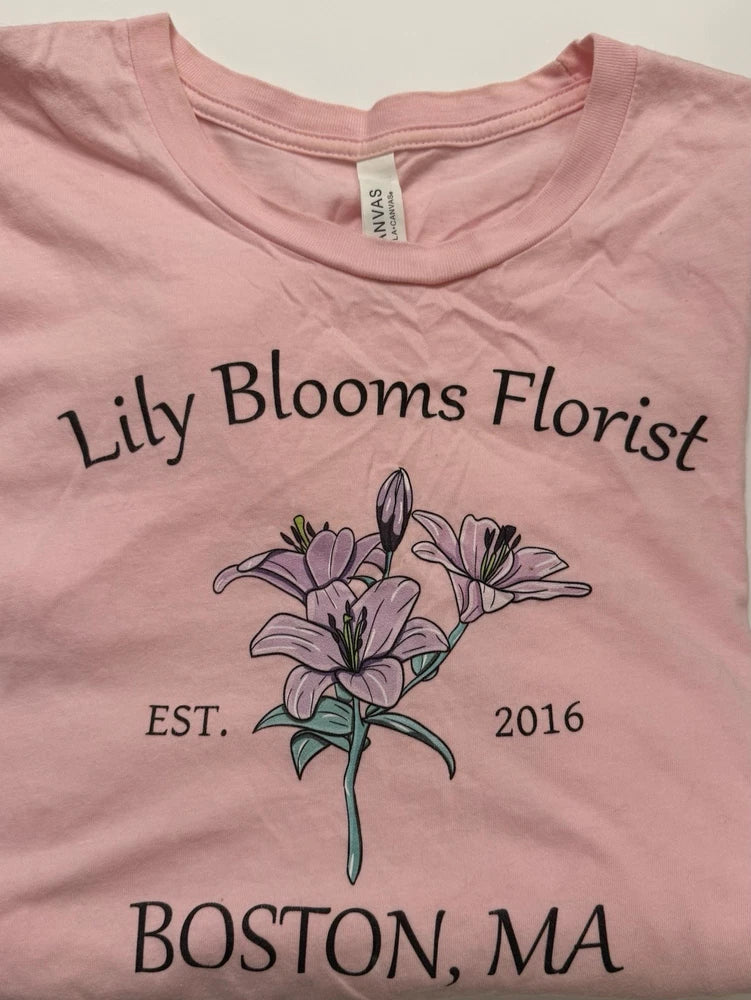 Pink T-shirt with lily flower bouquet graphic, 'Boston, MA' text