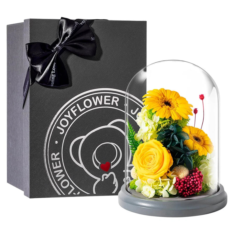 Glass dome centerpiece with yellow sunflower, yellow rose, and red berries on gray base