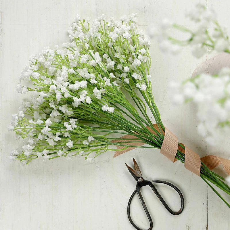 White baby breath artificial flower stems bouquet, tied bundle of small blossoms