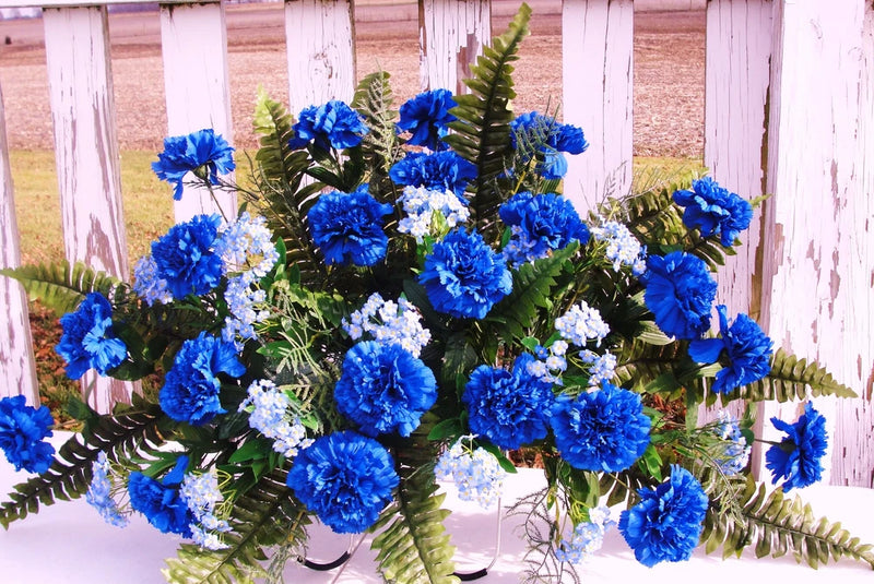 Cemetery grave memorial silk flowers bouquet with blue carnations and white blooms