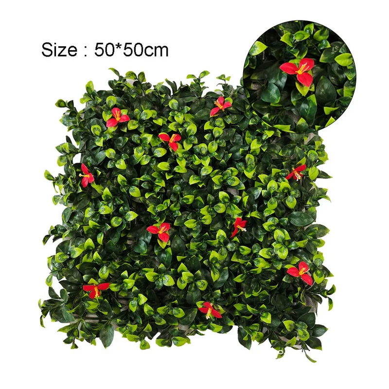 Artificial green turf mat with small red flowers and dense plastic foliage
