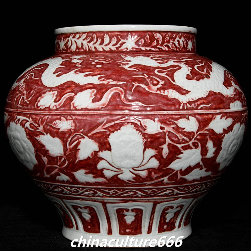 Red and white porcelain lidded jar with dragon and peony floral pattern