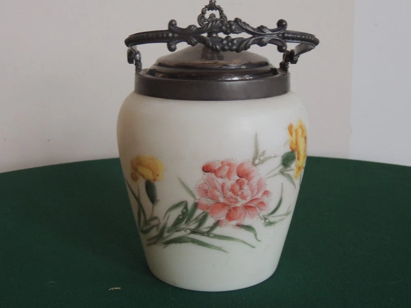 Antique satin glass biscuit jar with metal swing handle, cream floral carnation design