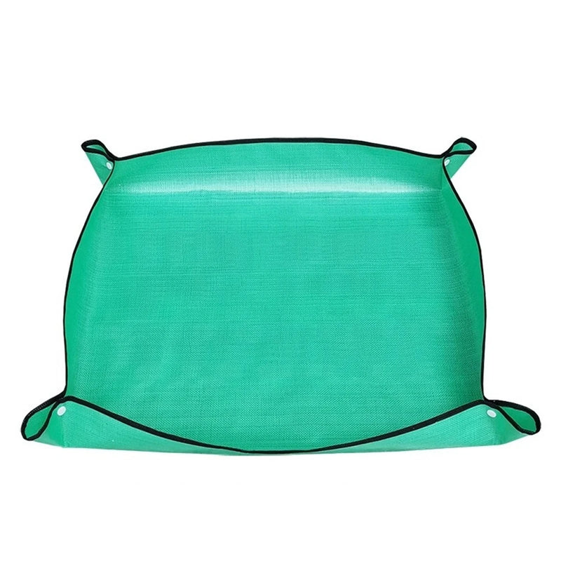 Foldable green planting mat with corner loop handles for garden cultivation