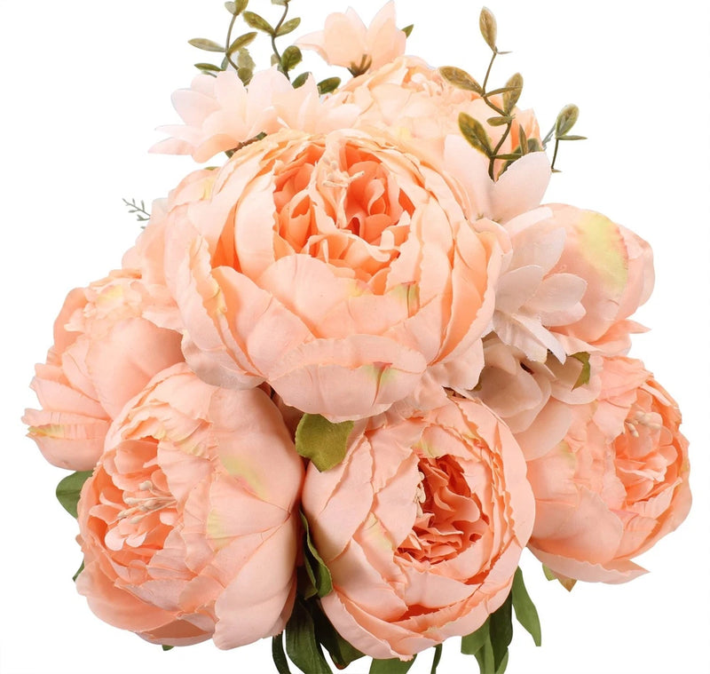 Artificial silk peony bouquet with orange and peach blooms and green leaves