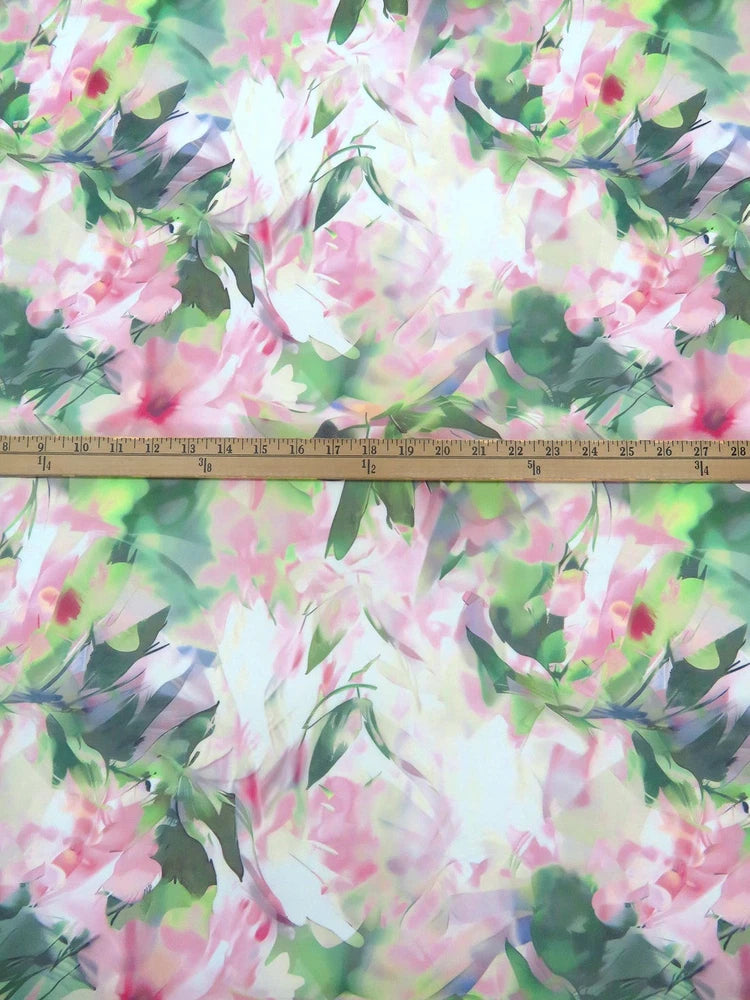 Floral chiffon fabric with pink and green painterly rose pattern