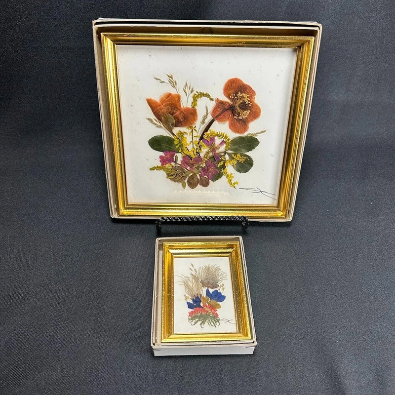 Set of 2 pressed dried flower artworks in gold wood frames, orange and purple blooms