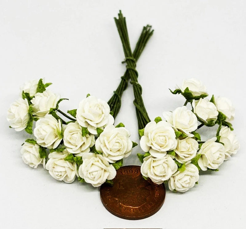 Miniature dolls house paper rose bunches, white blooms with green stems, tied together