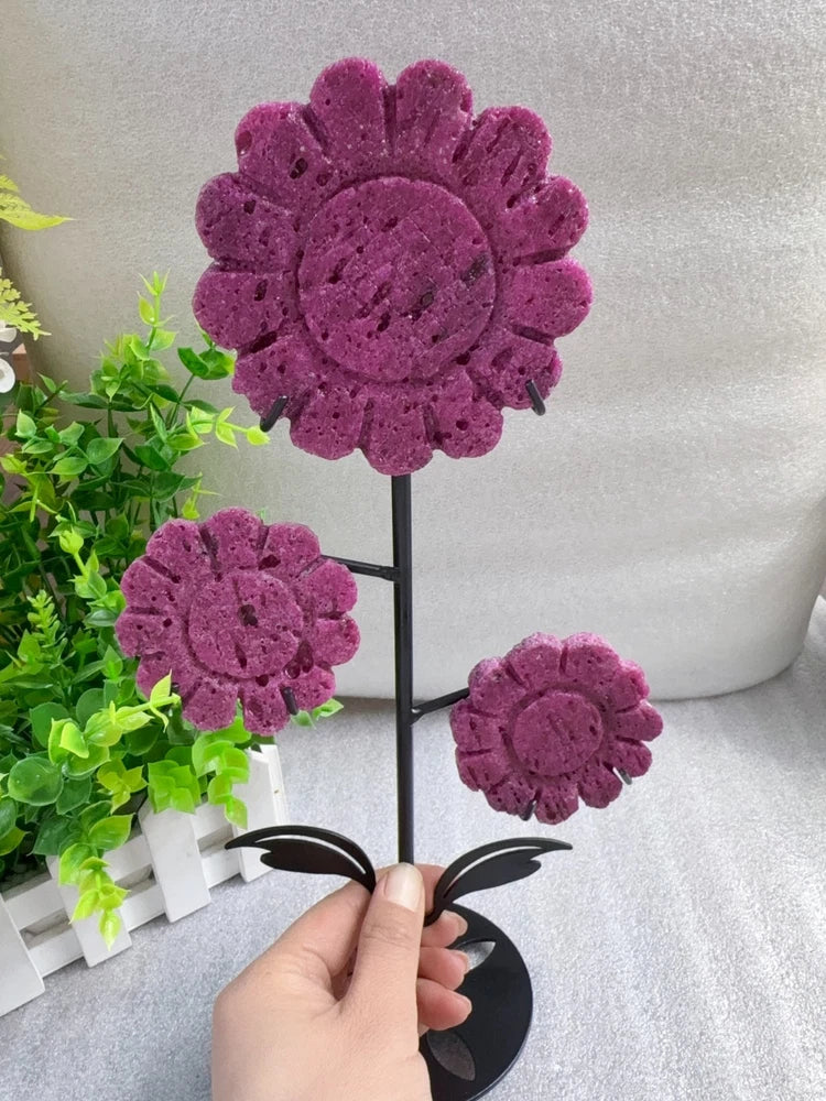 Ruby sunflower decor on dark stand, three purple crystal flower heads