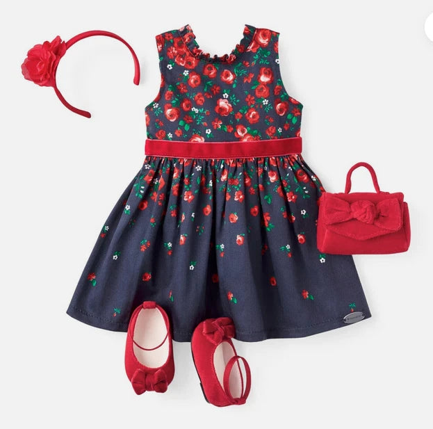 Navy floral sleeveless Easter dress with red belt, shoes, purse, and rose headband