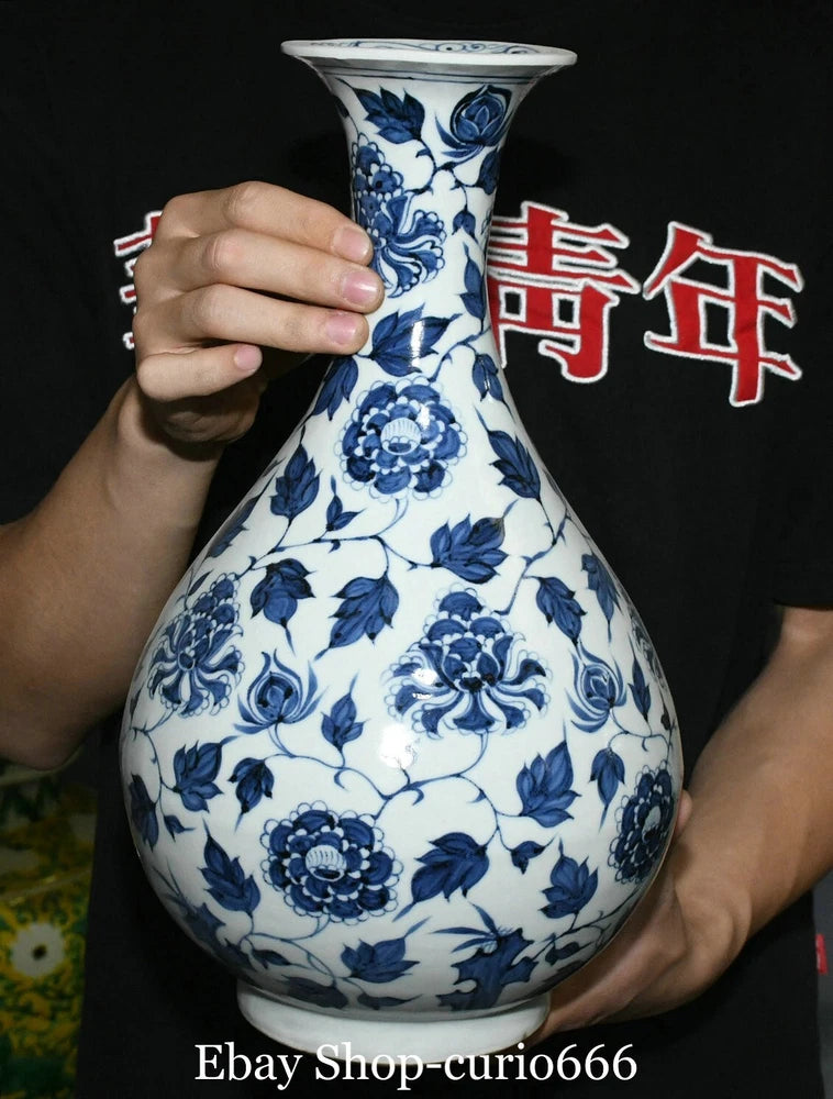 Blue and white porcelain peony flower vase with bulb body and narrow neck