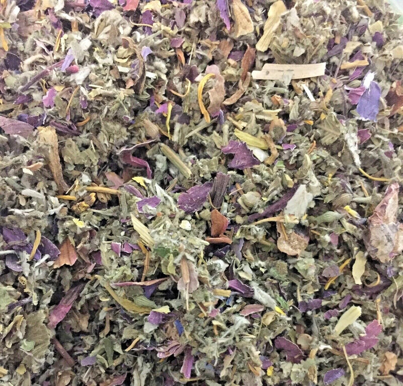 Loose dried herb and flower blend, purple, pale green, and tan pieces