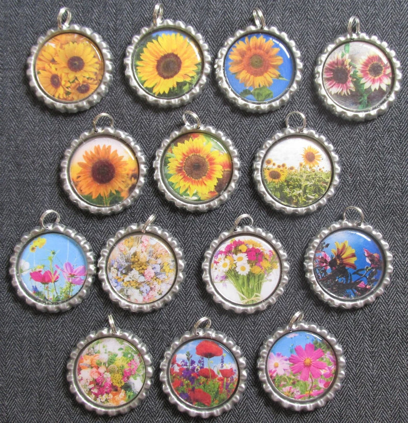 Round wildflower bottle cap charms with silver split rings, colorful flower designs