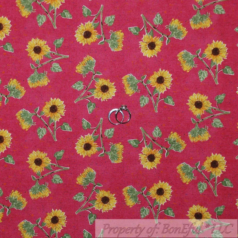 Cotton quilt fabric with yellow sunflowers, green leaves on pink background