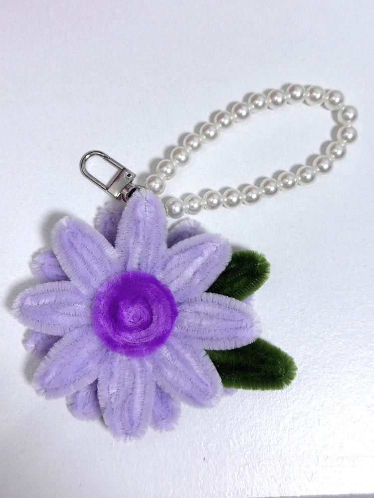 Purple felt sunflower keychain with pearl-like bead chain and metal clip