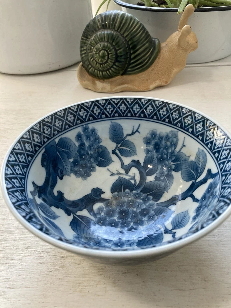 Blue hydrangea floral ceramic bowl with white rim