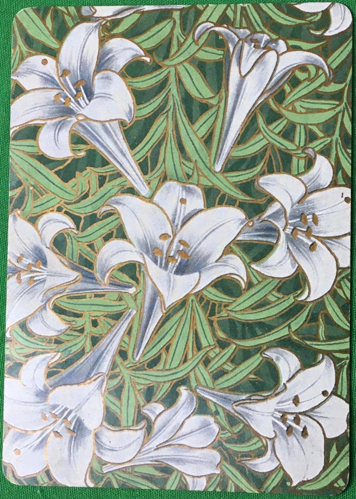 Antique lily motif playing card with white flowers and green leaves, wide design