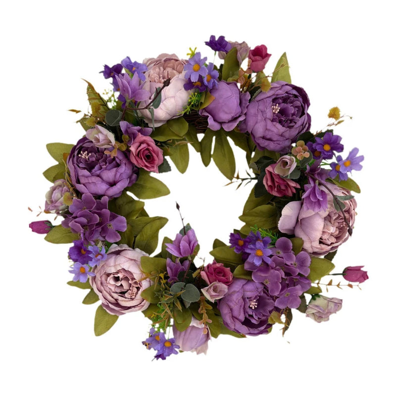 Artificial peony flower wreath with purple and pink faux blooms and green leaves