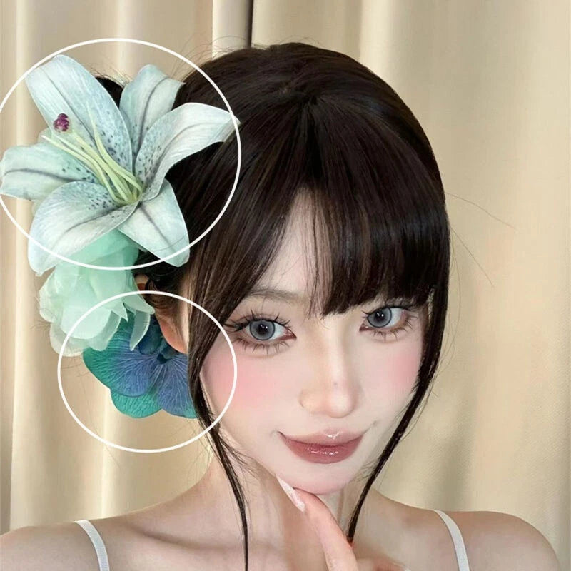 Artificial lily flower hair clip, light blue teal, side bun accessory