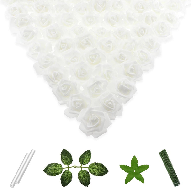 Artificial white rose heads with green leaves and heart-shaped decor pieces