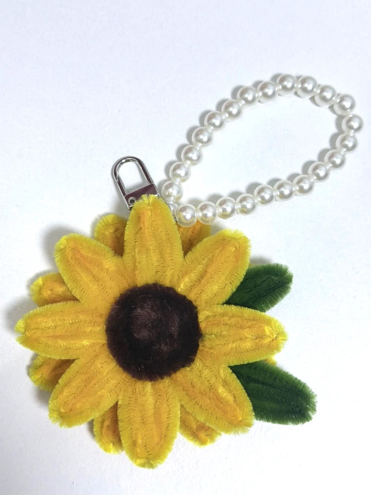 Yellow sunflower plush keychain with pearl beads and metal clip