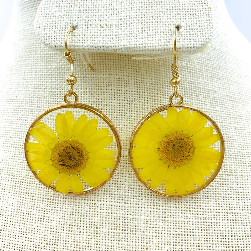 Yellow sunflower glass drop earrings with gold fish hooks, round transparent discs