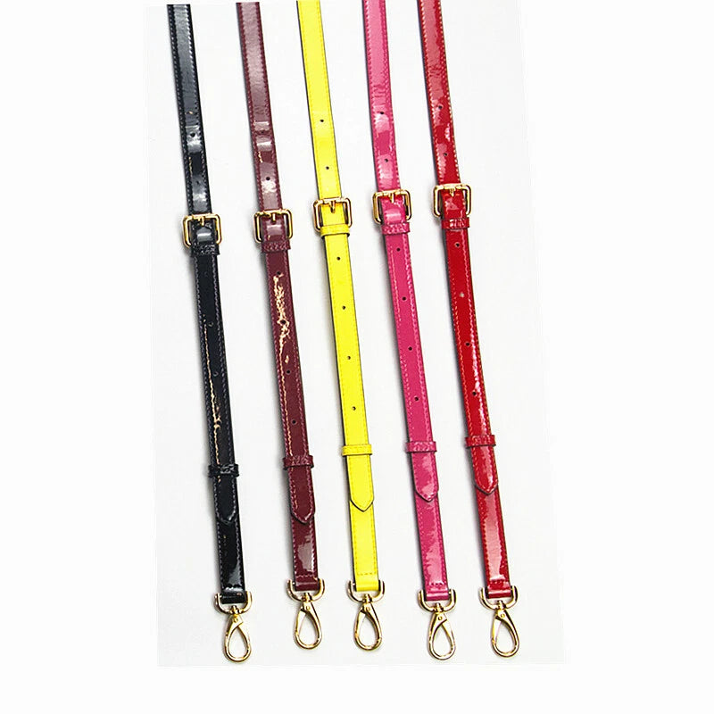 Patent leather crossbody bag straps with gold-tone clips, assorted colors