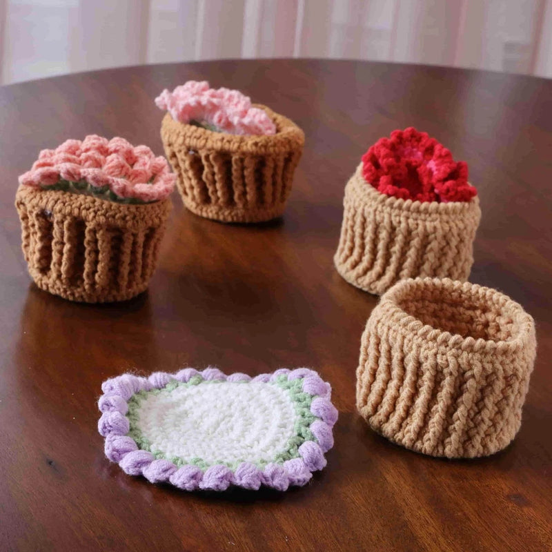 Handmade crochet cup coasters in pink, red, beige, and lavender trim—cup and round shapes.
