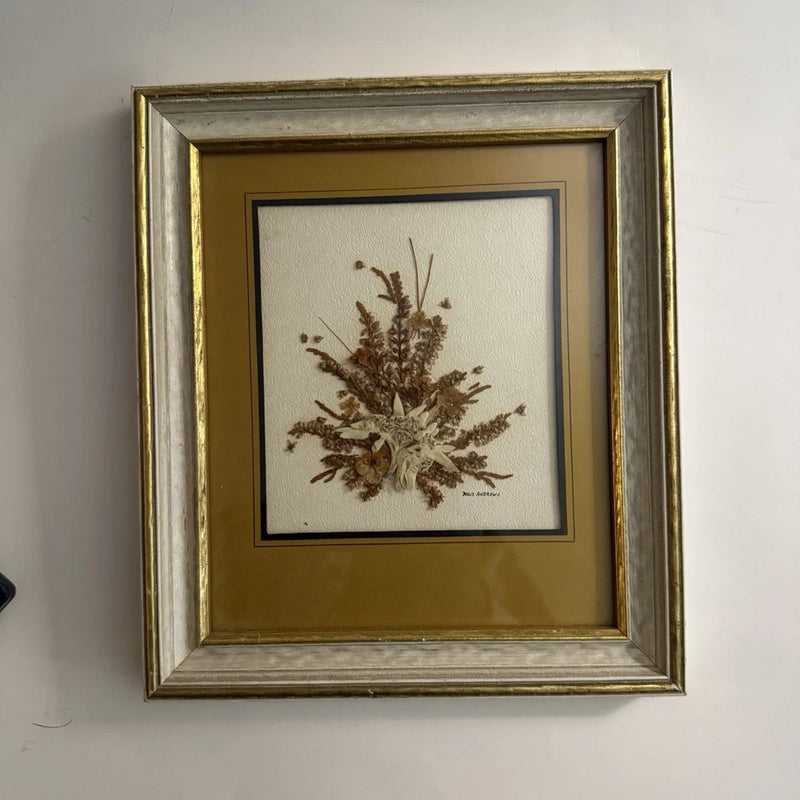 Two-tone framed pressed flower wall art with gold and gray mat, brown floral centerpiece