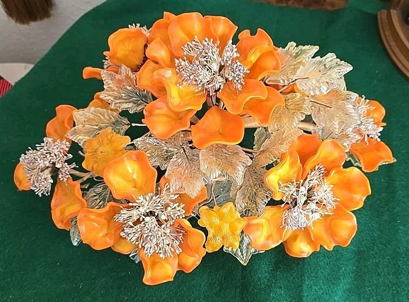 Orange and silver art glass flower arrangement centerpiece with peony-style blooms